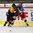 LUCERNE, SWITZERLAND - APRIL 17: Russia's Dmitri Sokolov #18 and Germany's Philipp Halbauer #6 battle during preliminary round action at the 2015 IIHF Ice Hockey U18 World Championship. (Photo by Matt Zambonin/HHOF-IIHF Images)

